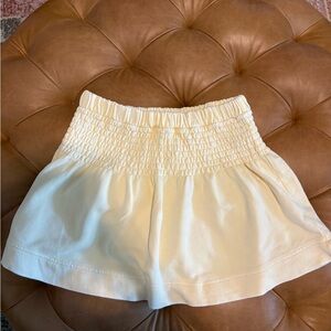 NWT Pale yellow swimsuit coverup skirt.